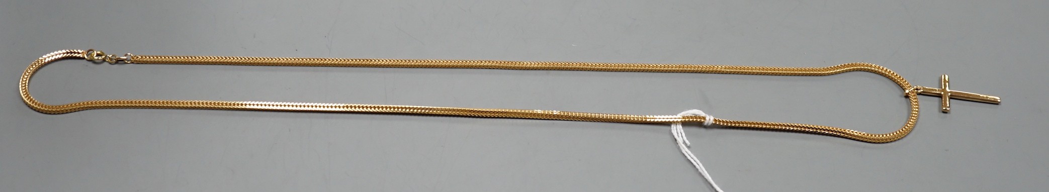 A modern Italian 750 yellow metal cross pendant, 32mm, on an Italian 750 chain, 66cm, 27.4 grams.